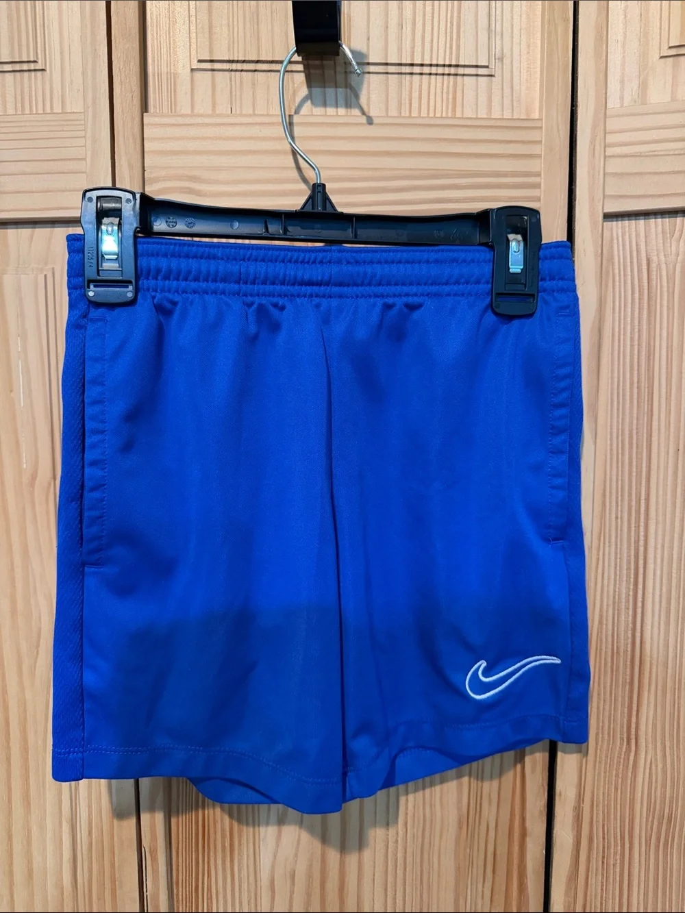 Nike Blue Kids Athletic Shorts with White Swoosh
